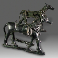 A Luristan Bronze Horse Bit With Cheek Pieces