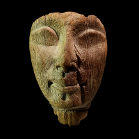 An Egyptian New Kingdom Wood Mask of a Sarcophagus