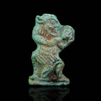 An Amulet of Bes Playing the Tambourine