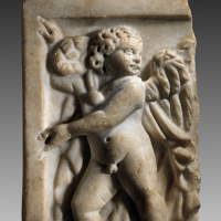 A Roman Marble Relief Fragment Showing Eros