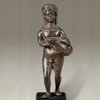 A Roman Bronze Statuette of a Youth