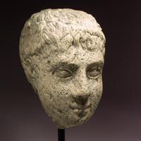  An Etruscan Limestone Head