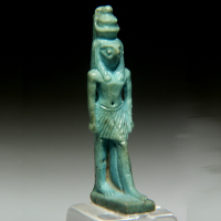 A Glazed Composition Amulet of the God Horus