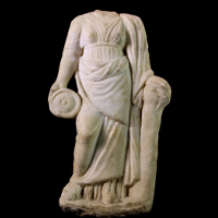  A Marble Statuette of a Priestess or Goddess with Libation Vessel