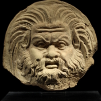 A Western Greek Antefix with the Head of a Satyr