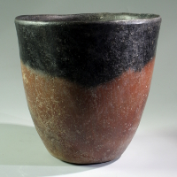 An Egyptian Blacktop Redware Beaker, Pre-Dynastic Period