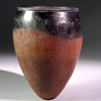 An Egyptian Blacktop Redware Beaker, Pre-Dynastic Period