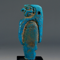 A Turquoise Amulet of the God Qebehsenuf