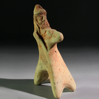 A Near Eastern Terracotta Statuette of a Horse and Rider