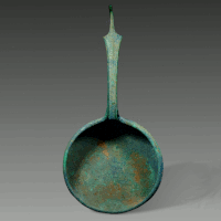 An Etruscan Bronze Patera with Decorated Handle