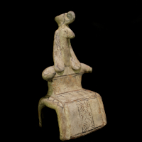A Terracotta Figure of an Enthroned Goddess