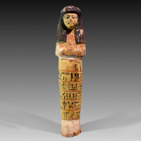 A Huge Egyptian New Kingdom Wood Shabti with a Striking Textual Detail
