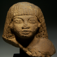 A Quartzite Bust of an Official, Dating to the Reign of Amenhotep III